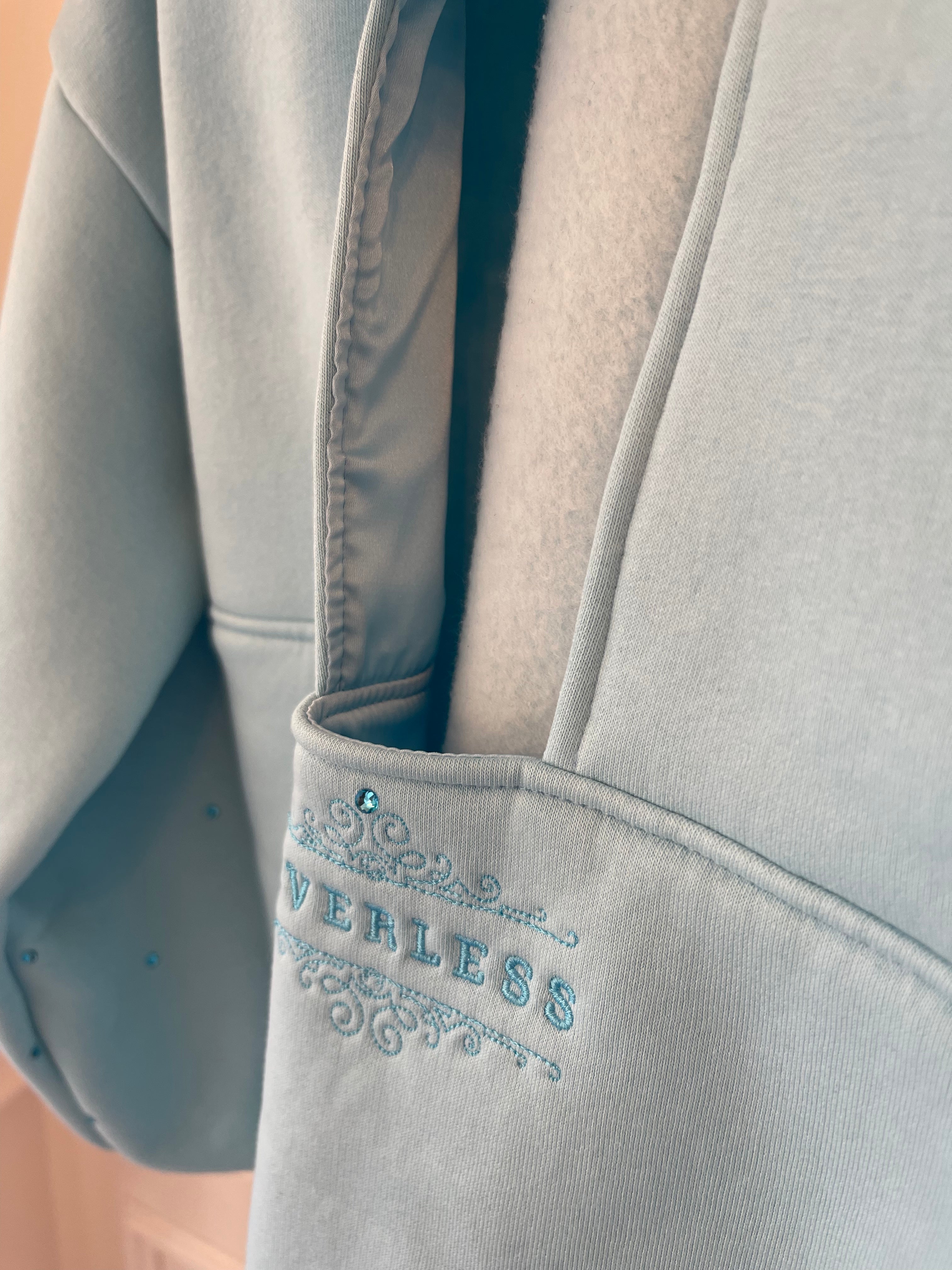"Blush" CRISTALE sweatshirt with bare back and bell sleeves BABY BLUE "Blush" CRISTALE sweatshirt with bare back and bell sleeves BABY BLUE
