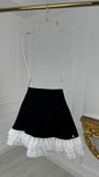 Short tennis skirt with hidden pants and ruffles Short tennis skirt with hidden pants and ruffles