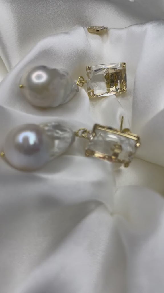Earrings with Baroque Natural Pearl by Shirley Navone. Earrings with Baroque Natural Pearl by Shirley Navone.