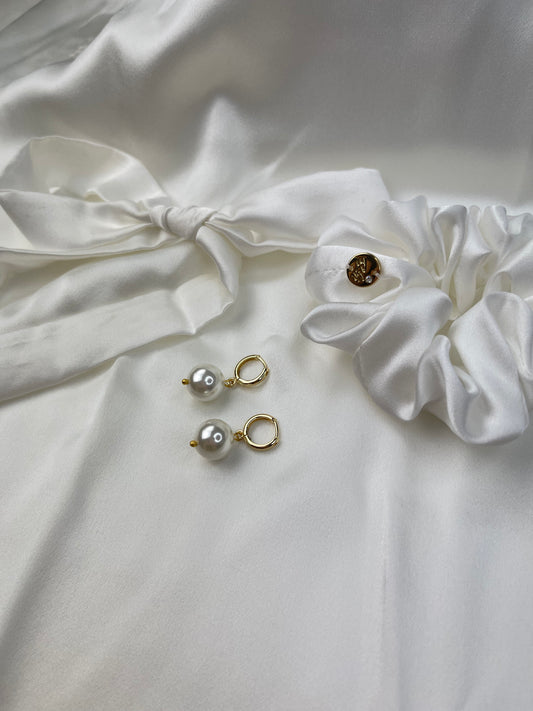 Aretes colgantes Pearls by Shirley Navone con perlas de concha natural