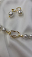 Load and play video in Gallery viewer, Drop Pearls Earrings by Shirley Navone with Natural Seashell Pearls.
