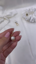 Load and play video in Gallery viewer, Drop Pearls Earrings by Shirley Navone with Natural Seashell Pearls.