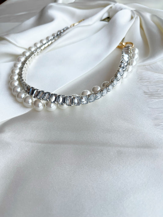 "Drama Queen" Choker by Shirley Navone with gold-plated metallic details, worn at the base of the neck
