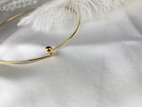 Golden Fixed Choker at the base of the neck by Shirley Navone, gold plated.